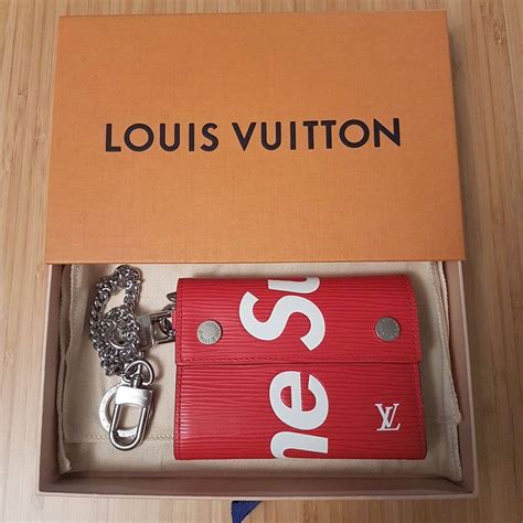 supreme x louis vuitton chain wallet replica|supreme louis vuitton wallet black.